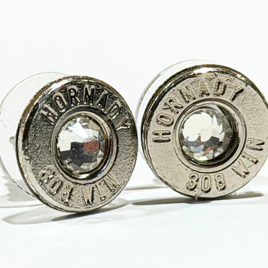 Örhänget Nova i silver av återbrukad Hornady .308 Win-hylsa – närbild på paret med stämpel och sten